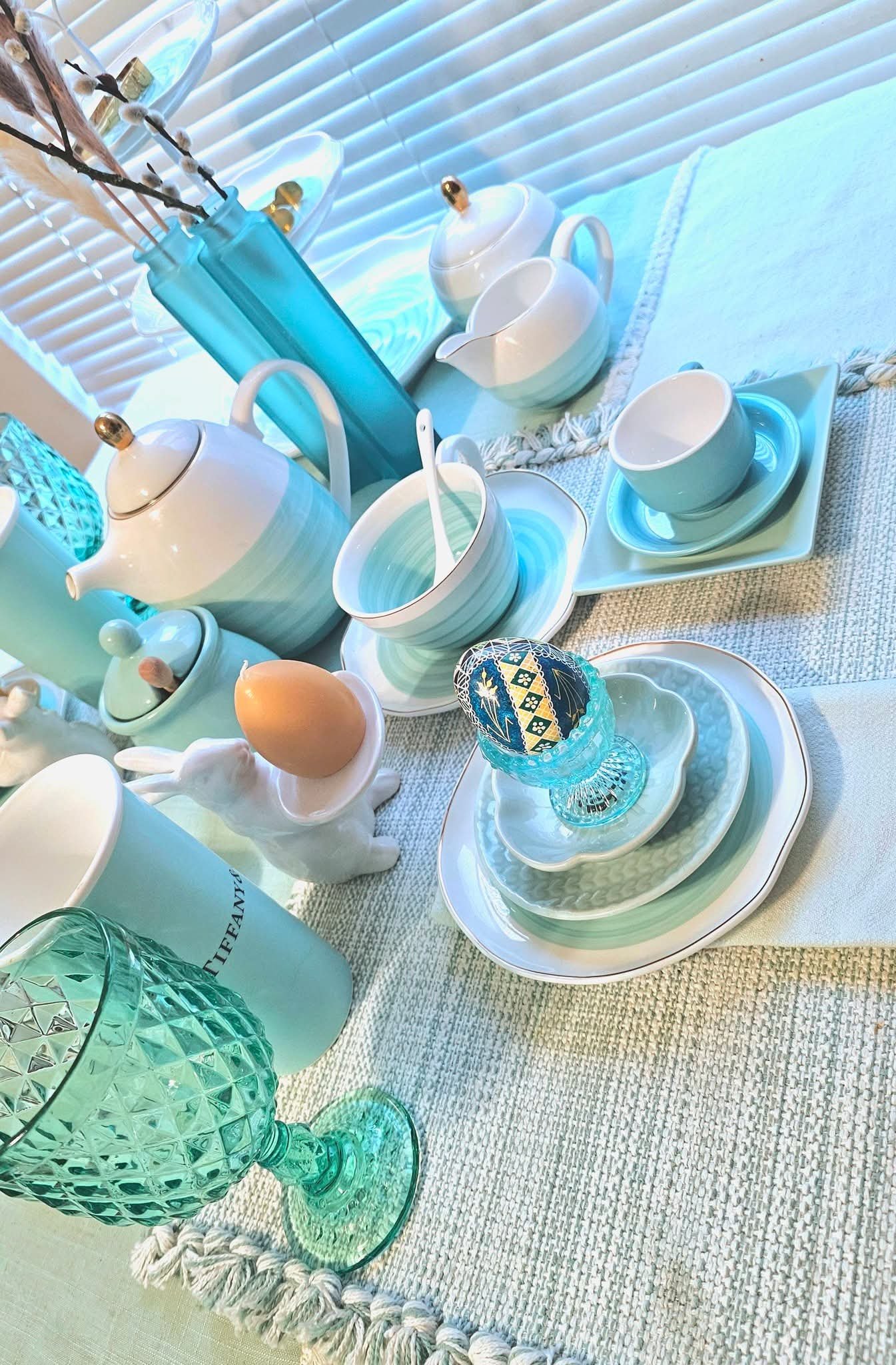 Tay's Tiffany blue and ivory tea set arranged with a decorated pysanka